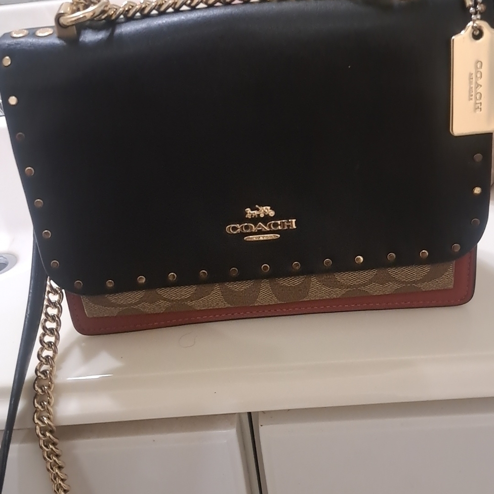 Coach Black and Tan Crossbody Bag with Gold Accents